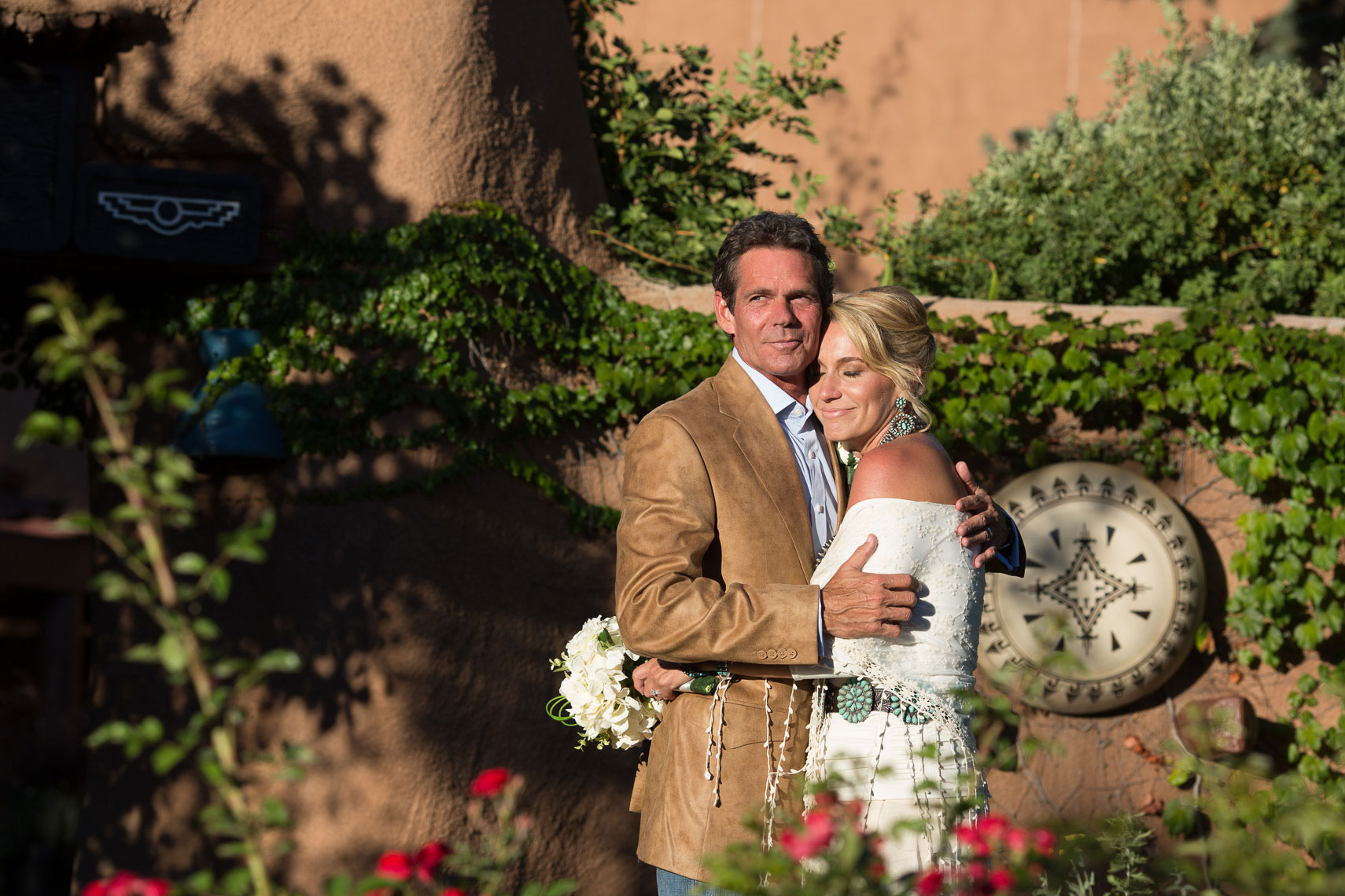 Wedding Couple at Inn of Loretto, Santa Fe with sunset light